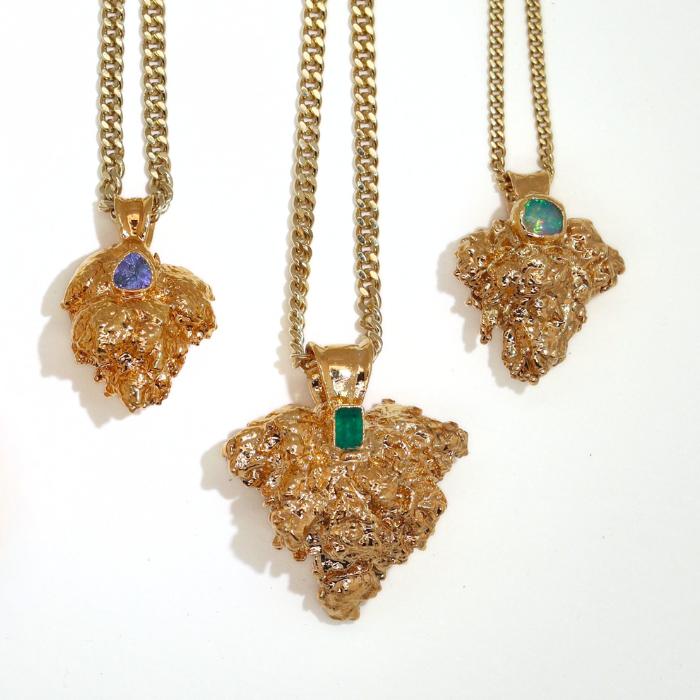 Ras Boss gold dipped bud jewelry handcrafted with the real cannabis plant. real weed nugs dipped in 24k gold